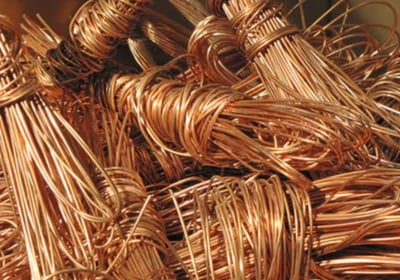a pile of copper wire wrapped in copper foil