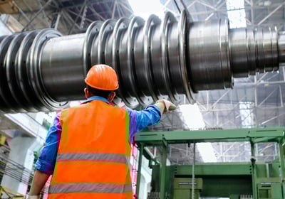 a man in a safety vest and a hard hat