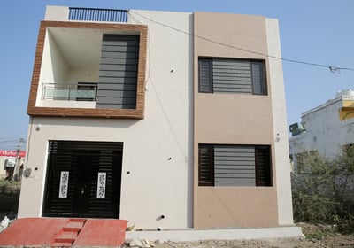 a house with a large window and a door