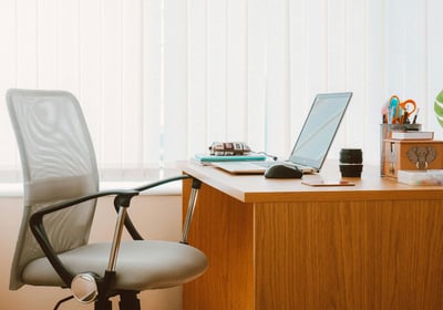 office desk with laptop