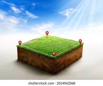 a grass field with pinpoint markers and pins on it