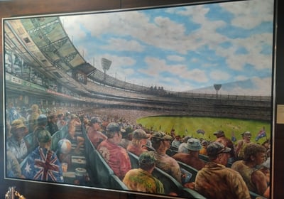 A colorful artwork showing a lively crowd at a baseball game held at the Melbourne Cricket Ground.