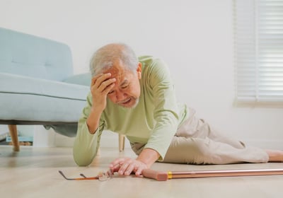 physiotherapy at home for seniors - an elderly man is upset on the floor after a fall
