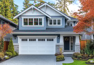 A very well kept house with a clean driveway