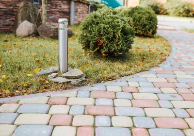 A walkway made of stone pavers