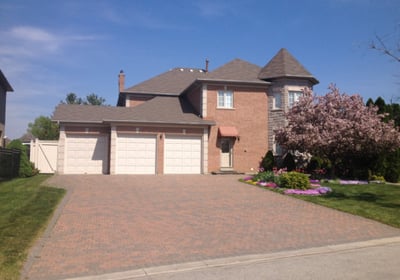 a house with a driveway and driveway with a driveway