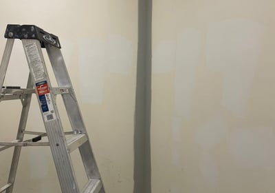 a ladder ladder ladder in a room with a ladder