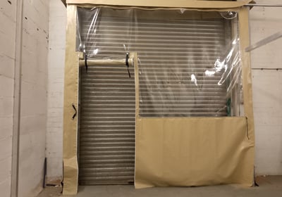 workshop roller door wind breaker with doorway