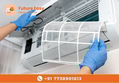 Technician cleaning an air conditioner filter, showcasing reliable AC repair services by Future Easy
