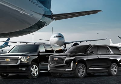 Black SUV at private airport terminal