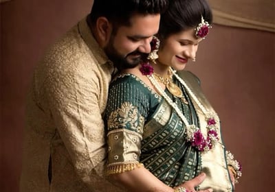 a man and woman in traditional indian attire