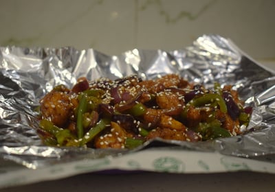 plating of dragon chicken .