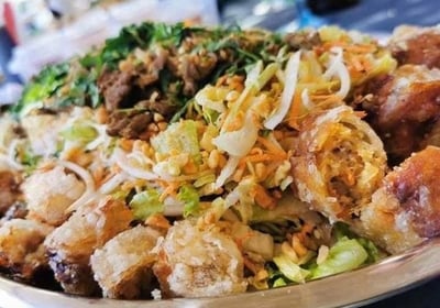 a plate of food with meat and vegetables