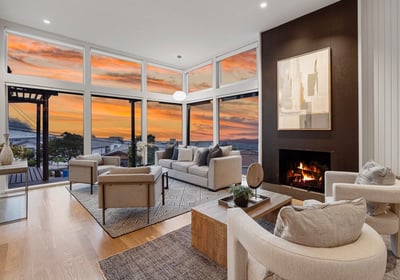 a living room with a fireplace and a fireplace