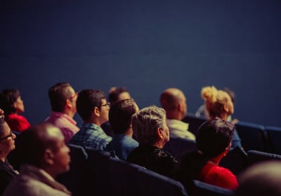 A Group of People Attending a Corporate Conference 