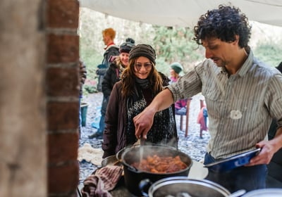 Tom otter from nomad serving food