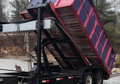 Unloading a dumpster