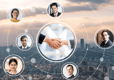 a business meeting with a handshake with a city in the background