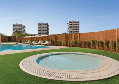 Heated outdoor pool and kids pool at Wyndham Residences Alvor Beach