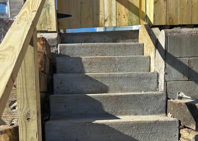 set of concrete stairs leading up to a backyard in Omaha nebraska