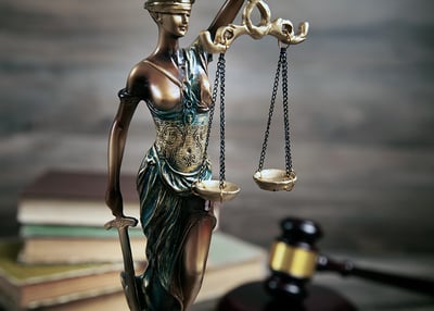 Statue of Lady Justice holding the scales 