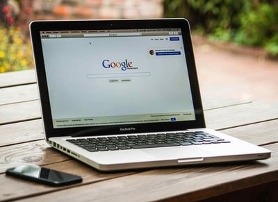 Google Homepage on Laptop Screen