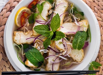 a bowl of food, pho, tofu and noodle