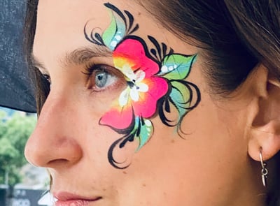 A Hibiscus Flower Eye Face Painting