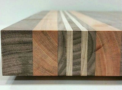 a wooden cutting board with a wooden cutting board