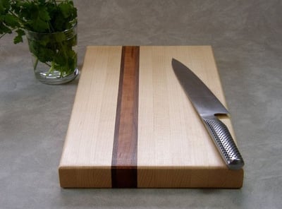 a knife and a knife on a cutting board