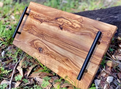 a wooden cutting board with a wooden cutting board