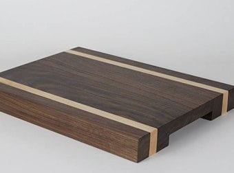 a cutting board with a wooden cutting board
