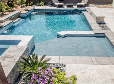 Luxury pool in Palo Alto featuring integrated lounge shelf, Baja shelf, and ambient lighting