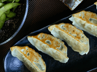 a plate of several vegan dumplings