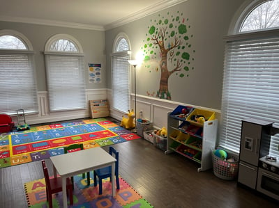 Photo of daycare room where children play.