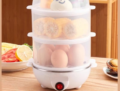 Cozedor elétrico multifuncional, ideal para cozinhar ovos de forma rápida e prática.