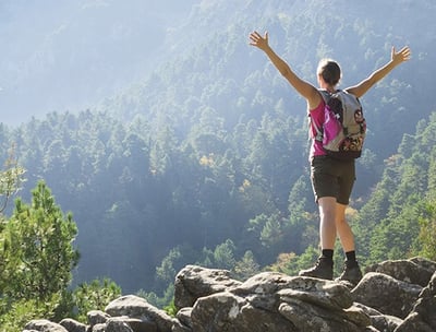 a man celebrating his therapy goal Overcoming challenges