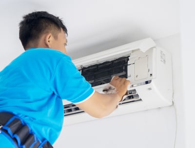 Air Condition Technician Repairing Aircon SYstem