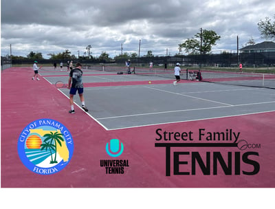 Male tennis players warming up for UTR Tennis Tournament in Panama City, FL.