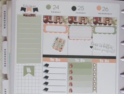 green and peach planner sticker layout in paper planner