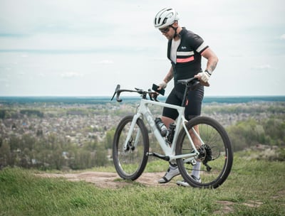 a man presenting his bike