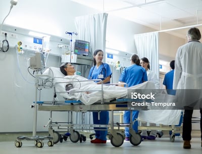a group of doctors and nurses in a hospital