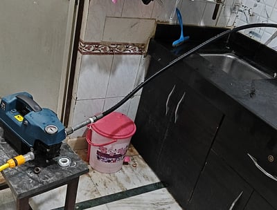 A blocked kitchen faucet with pressure pump