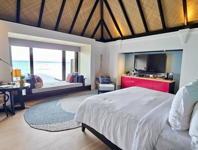 Four Seasons Kuda Huraa overwater villa bedroom 1