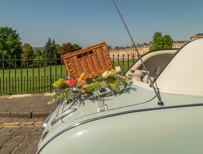 Picnic basket on back of Nissan Figaro