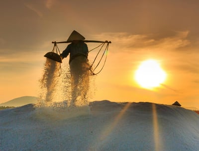 a person standing on a pile of salt