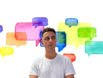 Ross Thompson Life Coach - Group Coaching Surrounded By Speech Bubbles.