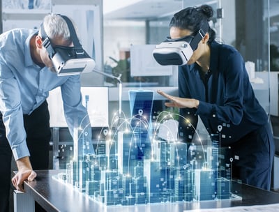 Professionals using virtual reality tools to train and manage building operations.