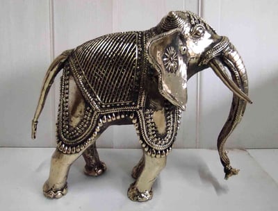 "Handcrafted brass elephant with artistic tribal design, right view-for overseas markets"