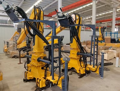 Customer order: Yellow ZM66.2 truck-mounted forestry cranes, pictured at our production facility.